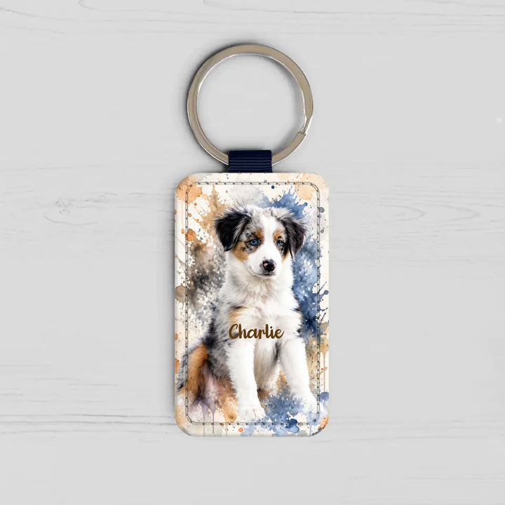 Rectangle faux leather keychain with a personalized watercolor pet portrait — example design