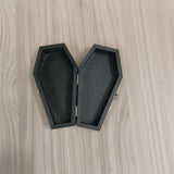 Open matte black wooden pet urn showing its interior